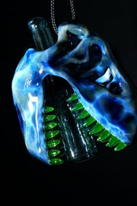 Image 4 of Fade to black T-Rex skull pendant with uv stardust tip & illuminati teeth 🦖😤