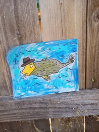 Image 4 of Fish Swimming In Hat