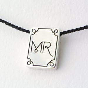 Image of MR monogram token