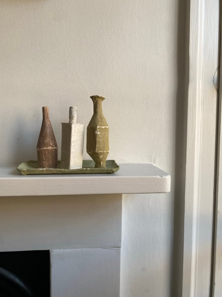 3 Vessels on a long green tray