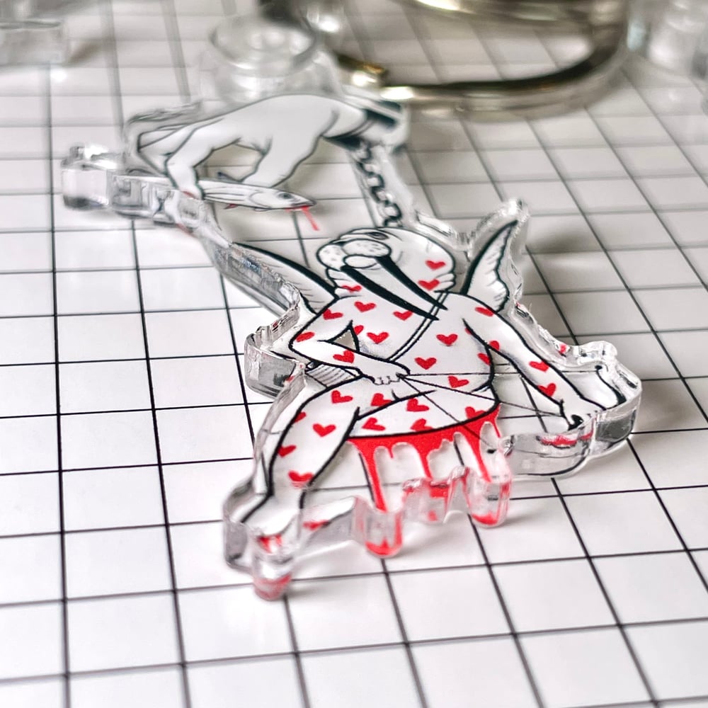 Image of tiny acrylic keychain tease