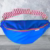 Image 4 of Medium royal blue bumbag with red zip 