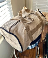 Image 1 of Tan + Black Duffle Bag