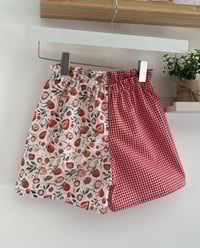 Image 1 of Strawberry shorts 9-12m 