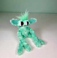 Image 1 of Small Weighted Side Eye Monster - Mint