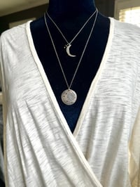 Image 2 of sterling silver moon pendant with brave inscription and green tourmaline