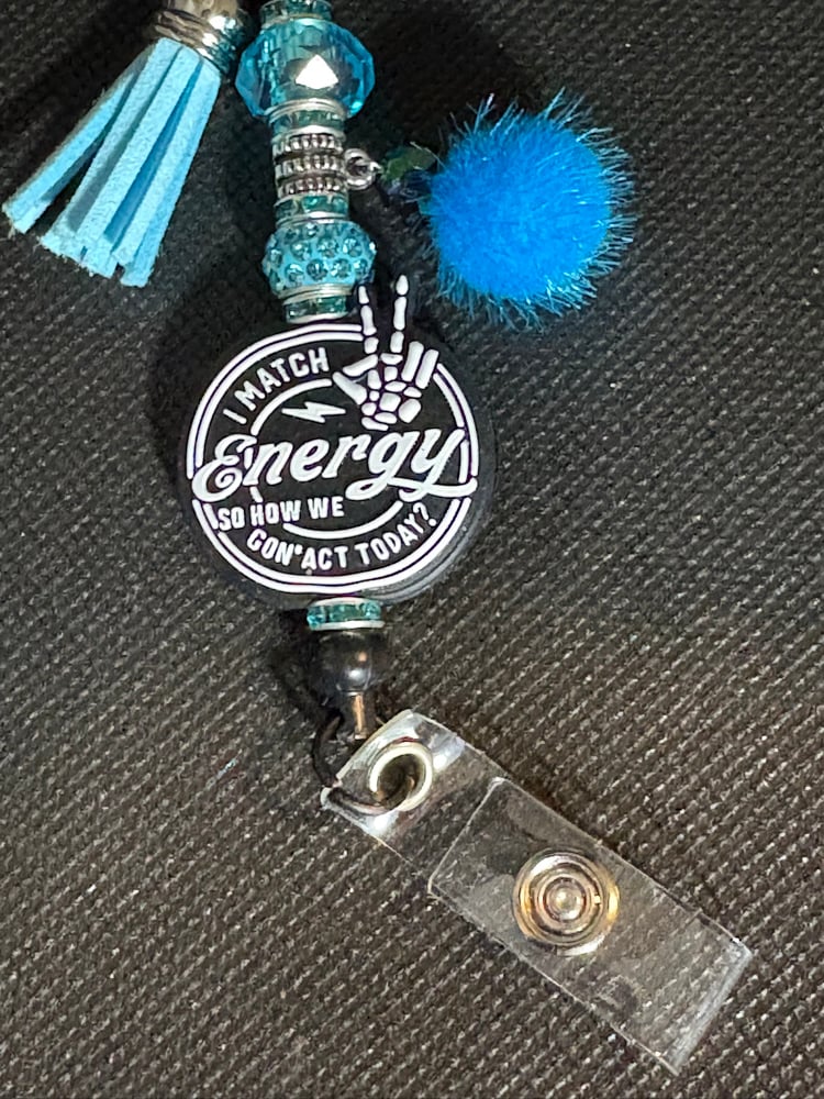 Image of Black and Blue I match energy  Badge Reel with Tassel