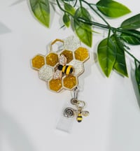Image 2 of honey comb badge reel 