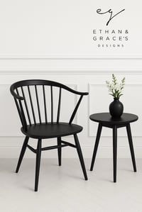 Ercol black cowhorn chair 