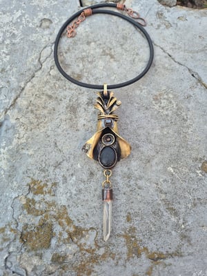 Bullet casings, pebbles and crystal necklace 