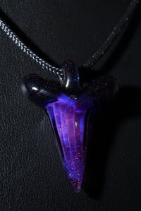 Image 2 of Fully crushed opal glass shark tooth pendant.