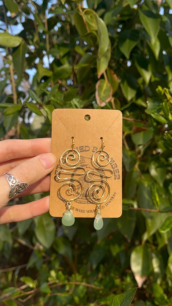 Image of Crystal swirl drop earrings