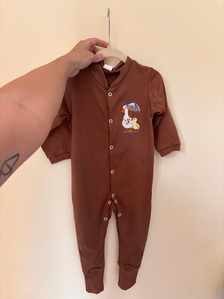 Image of Brown baby grow 12-18