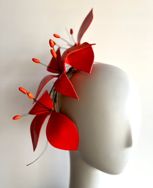 Image of Vibrant orange flower headpiece   