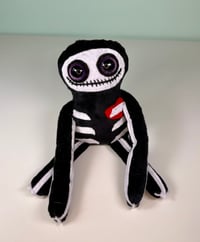 Image 1 of Weighted Medium Skeleton - Black & White