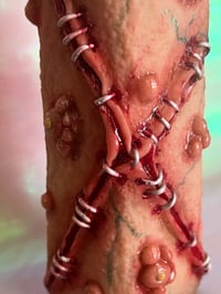 Image 2 of Stapled Flesh Potion Bottle