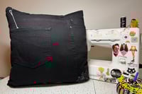 Image 2 of Upcycled “Death Kitten” t-shirt pillow with denim pockets