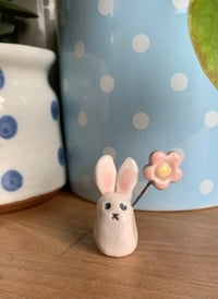 Image 5 of Ceramic Cute Bunny holding a pastel Flower