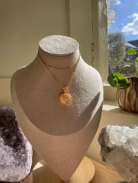 Image 3 of Gold Glowy Flower Agate Heart Crystal Necklace
