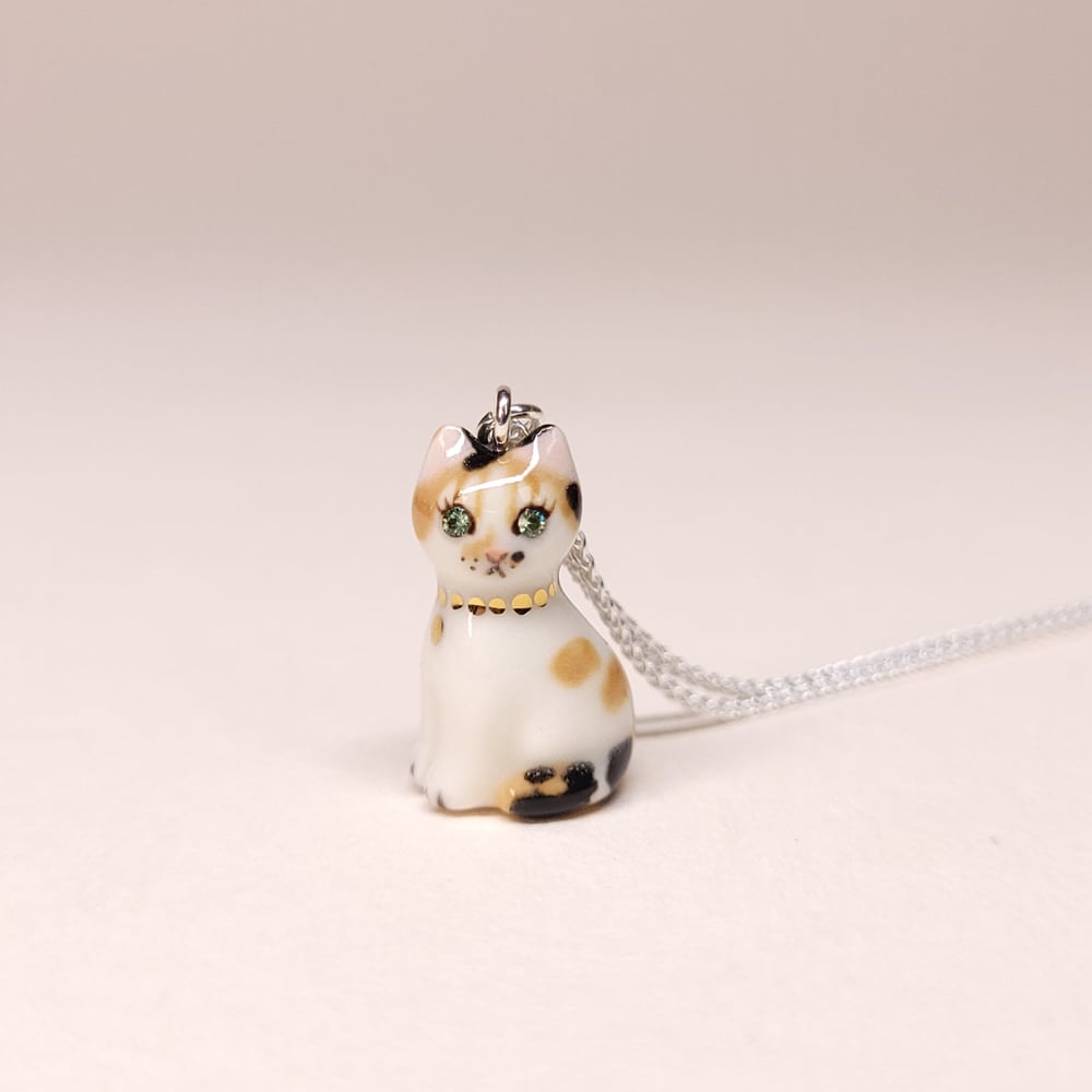 Image of Calico Porcelain & Sterling Silver Sitting Kitten Pendant