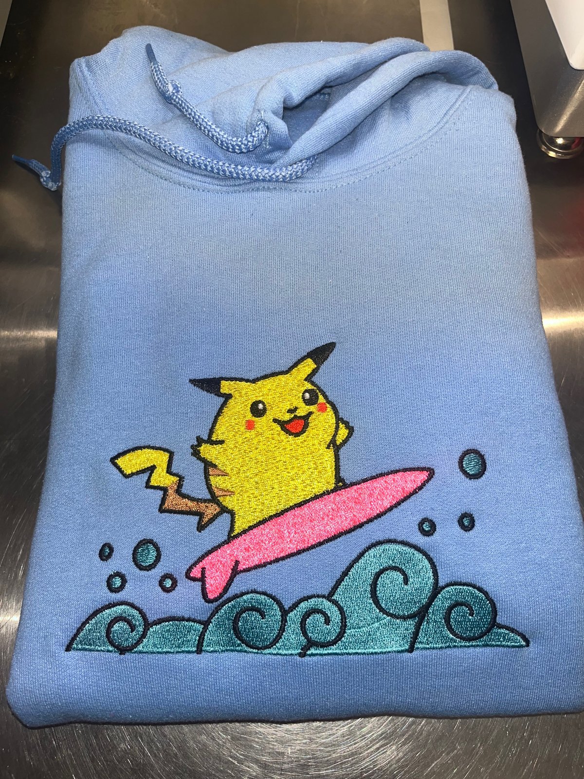 Surfing store pikachu hoodie