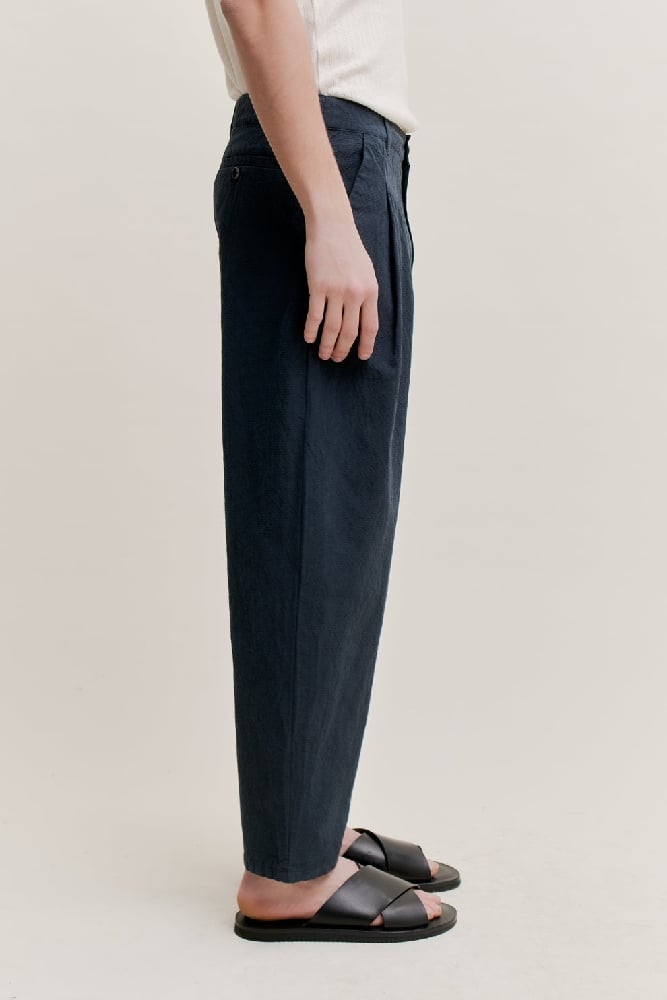 Image of A KIND OF GUISE FOLDED WIDE TROUSERS DARK INCENSE