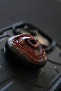 Image 12 of Custom Swappable Phone Grip for smartphones, reflective pupil, green glow in the dark