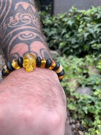 Image 5 of Bog oak and Amber skull bracelet. 