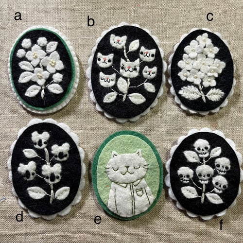 Image of cameo brooches // fall 2025