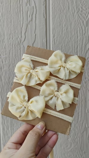 Image of Soft yellow bow