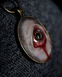 Image 6 of Color Shift Eye glow in the dark pendant OOAK