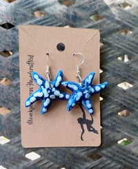 Image 2 of Blue and white starfish