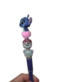 Image 3 of Alien With Doll Pen