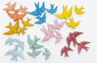 Image 1 of Hirondelles en céramiques