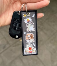 Image 2 of Trash Bandit Jet Tag