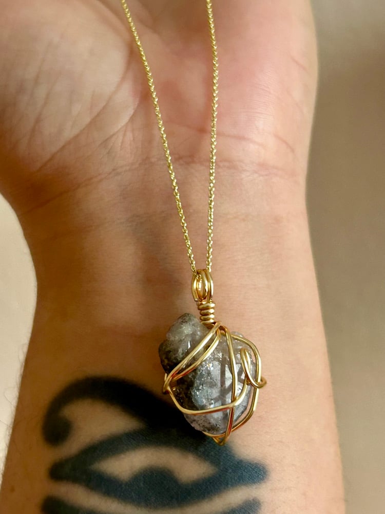 Image of Apatite with Actinolite inclusions