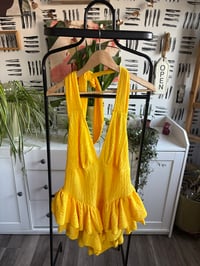 Image 1 of Yellow flirty, short  jumper 