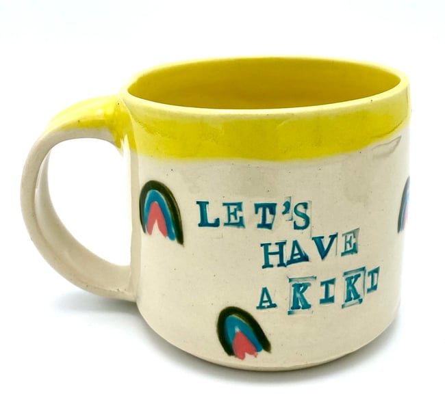 Let’s Have a Kiki Mugs