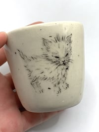 Image 1 of This kitty craves chaos in red