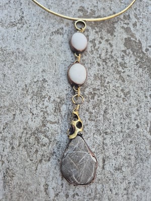 Pebbles and bullet cassings necklace 