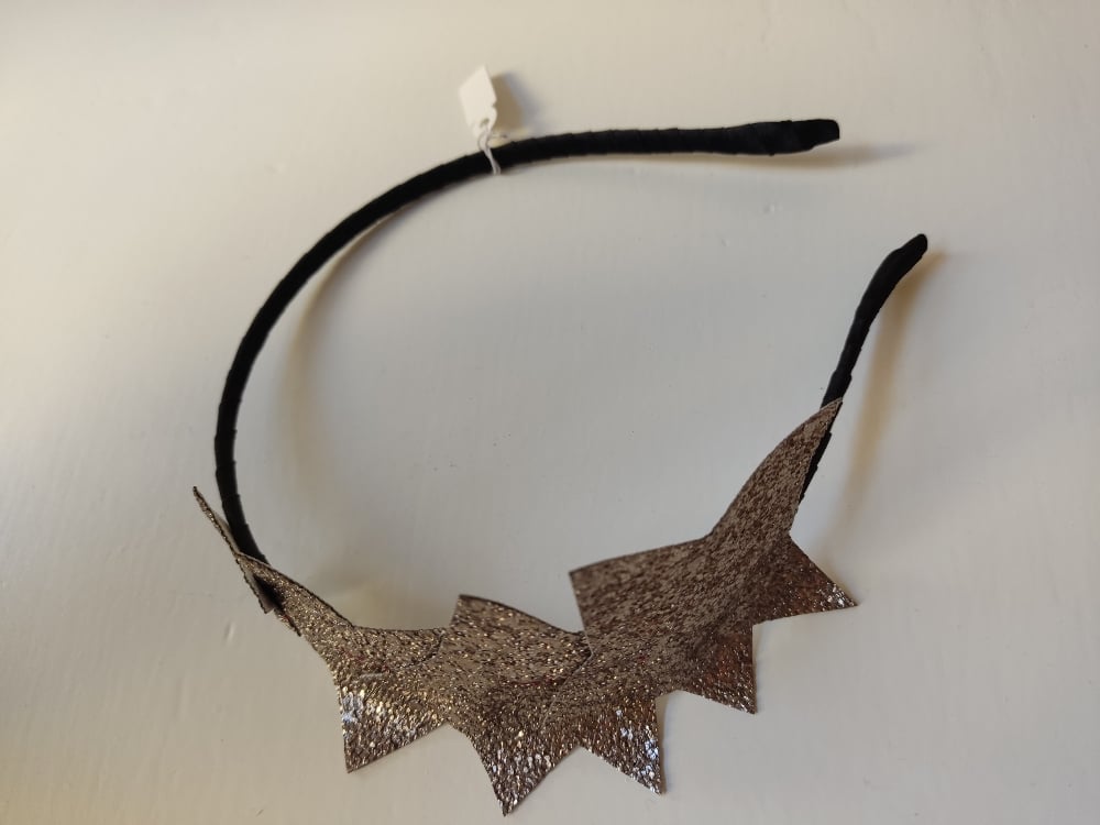 Image of Cerchietto stelle base nera