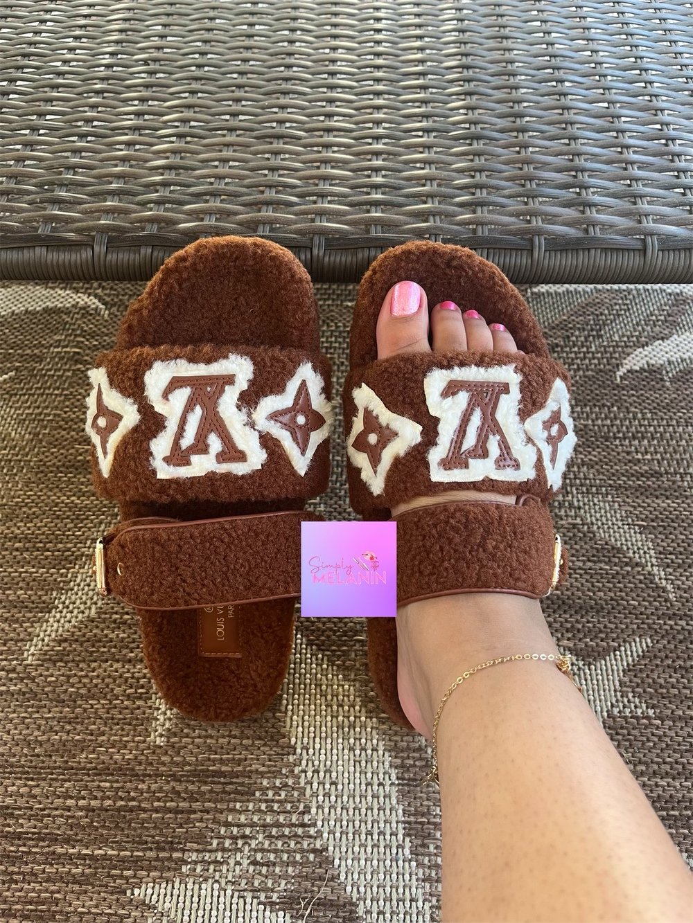 Image of fuzzy sandals 💜. 