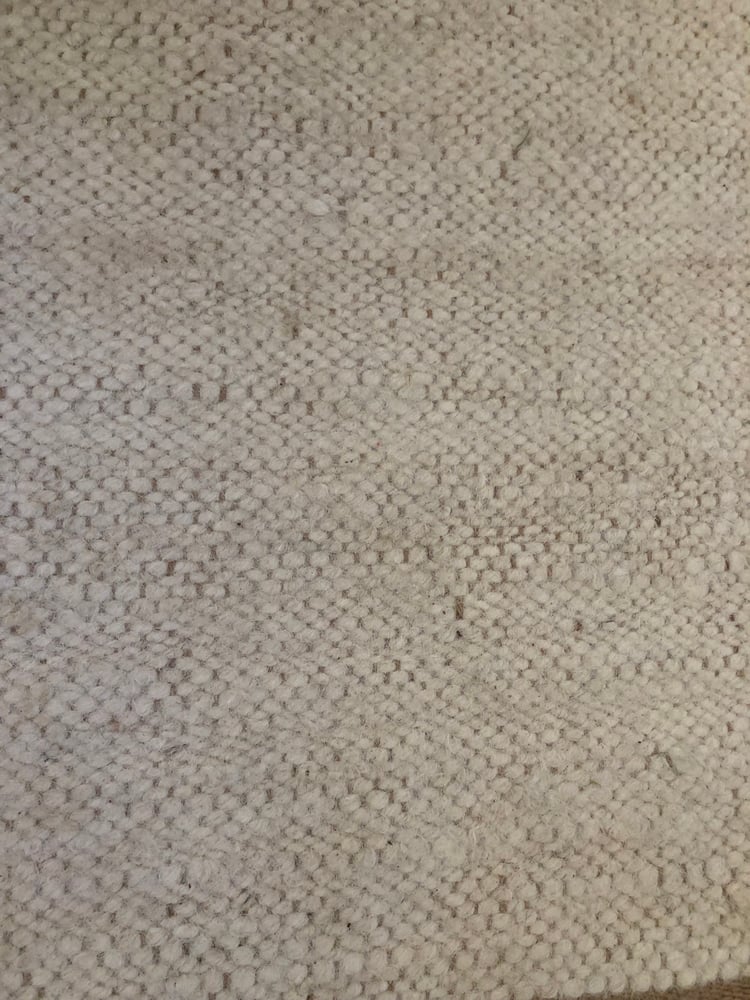 Image of Tapis laine coloris crème 