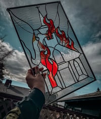 Image 1 of The only church that illuminates is a burning church
