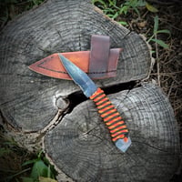 Image 1 of Little Heathen- Orange and black
