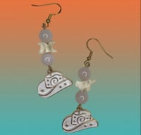 Rattlesnake vertebrae and rose quartz cowgirl dangles