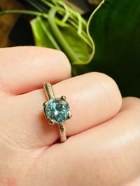 Image 10 of size 6.5 blue zircon ring with sterling twig band