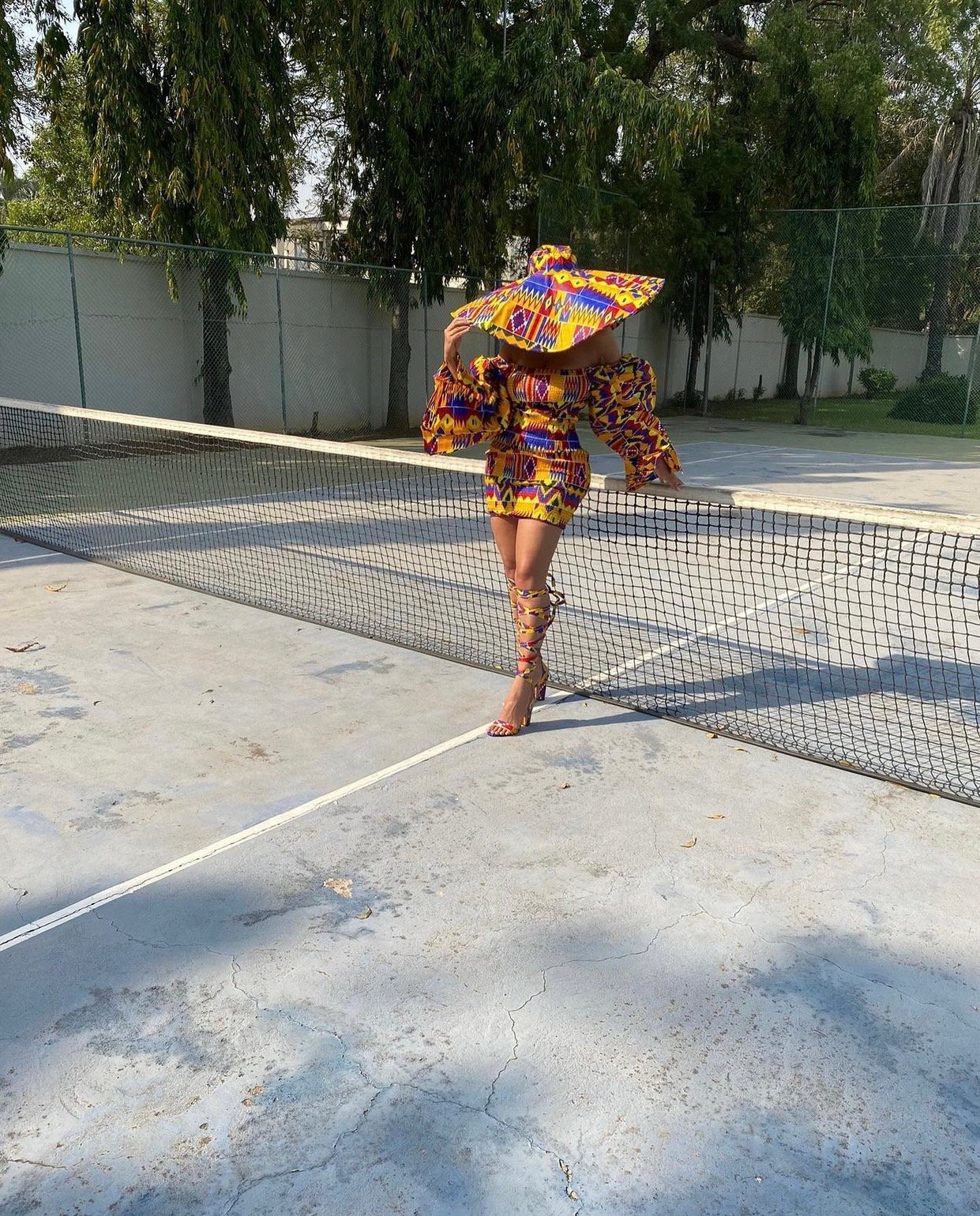 Image of 'KENTE' PRINTED ELASTIC DRESS WITH PUFF SLEEVES (MEDIUM)