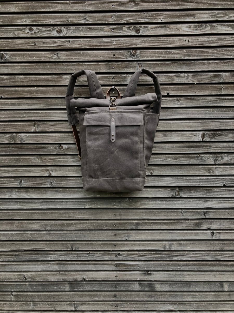 Image of Waterproof back to school backpack with padded shoulder straps and water bottle pocket