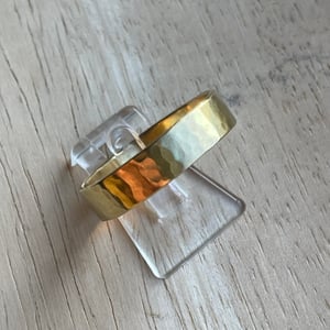Image of Hammered 18ct yellow gold wedding band